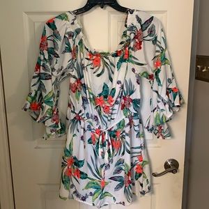 White floral shirt romper with flowy sleeves